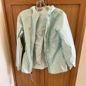 Columbia rain jacket. Mint color. Size youth XL. Fits like adult small. NWT